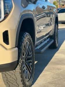 tan custom gmc pickup front tire