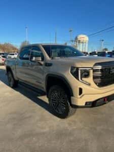 tan custom gmc pickup passenger angle