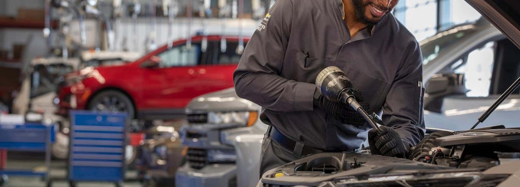 car being worked on by service provider
