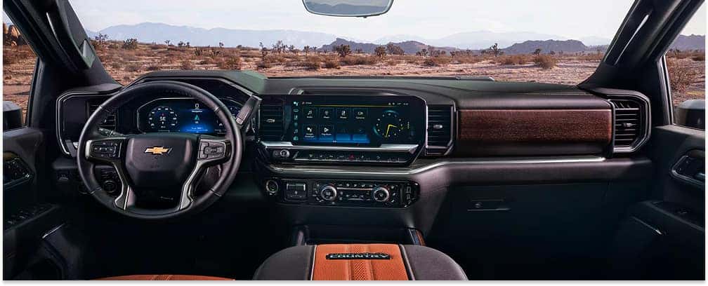 Interior dashboard and center console of a 2026 Chevrolet Silverado HD High Country.