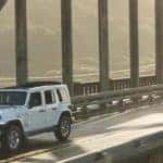 jeep-wrangler-driving-over-bridge