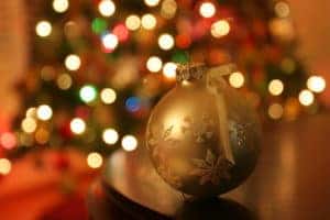A close up of two festive Christmas tree ornaments