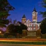 Samford Hall in Auburn, AL, lit up at night.