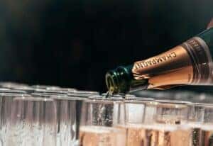 Pouring champagne at a New Years Eve event in Auburn, AL