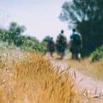 3 hikers walking along a trail in Auburn, AL