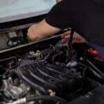 An auto mechanic working on a Hyundai Elantra in Auburn, AL