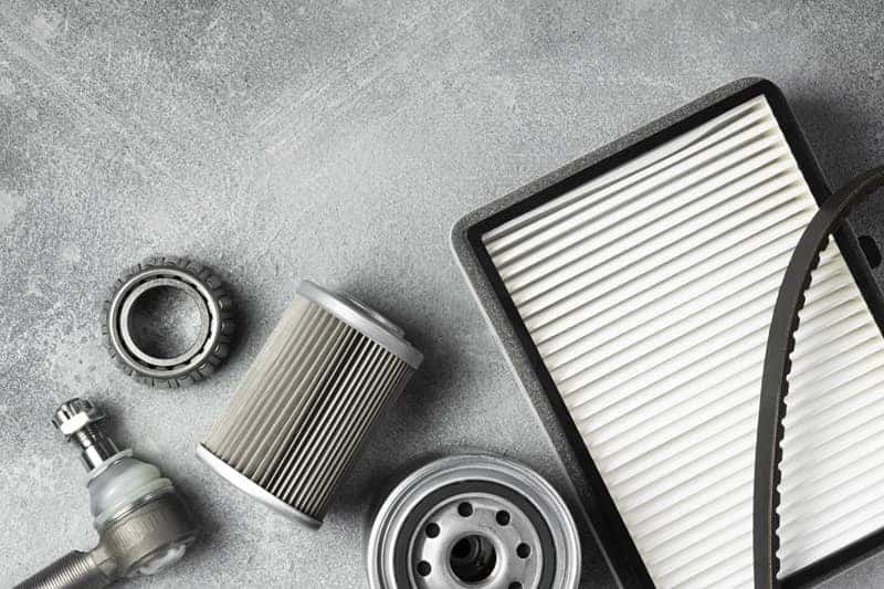 Assorted car parts lying on the ground