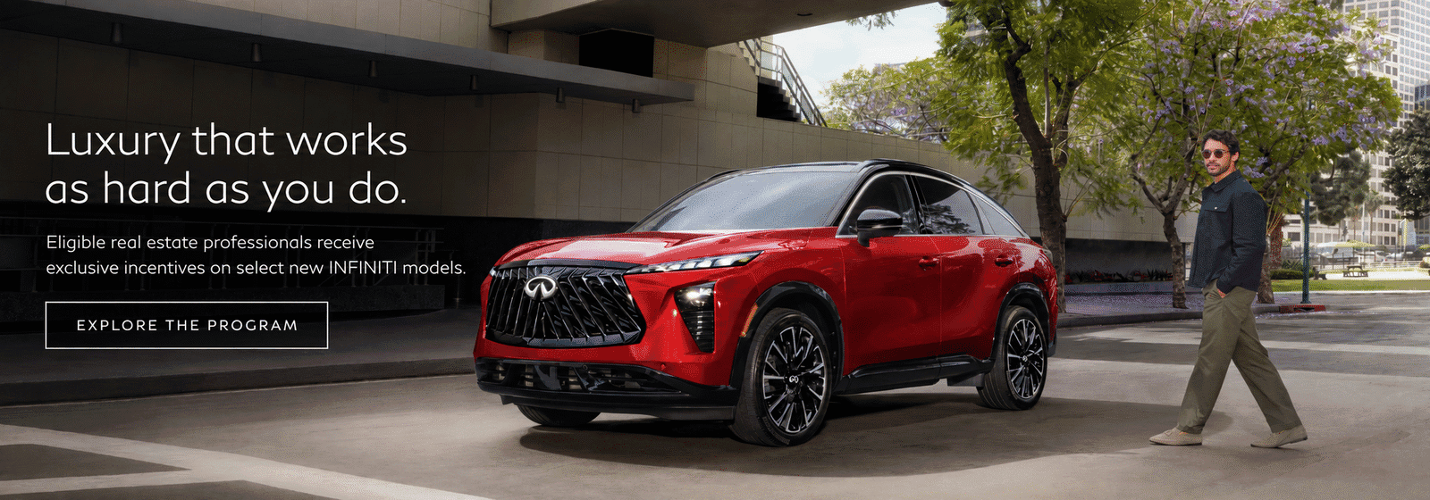Red INFINITI luxury SUV beside a real estate professional with text promoting exclusive incentives for eligible real estate professionals.