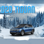 20 Tiguan in blue parked on snowy mountain