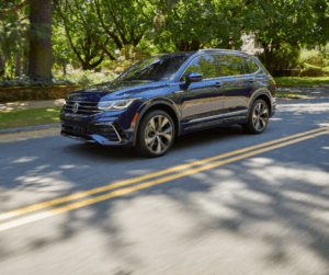 2022 Blue Metallic VW Tiguan in a suburban setting.