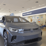 Kalispell Volkswagen Dealership Show Room with a gray 2023 ID.4 VW