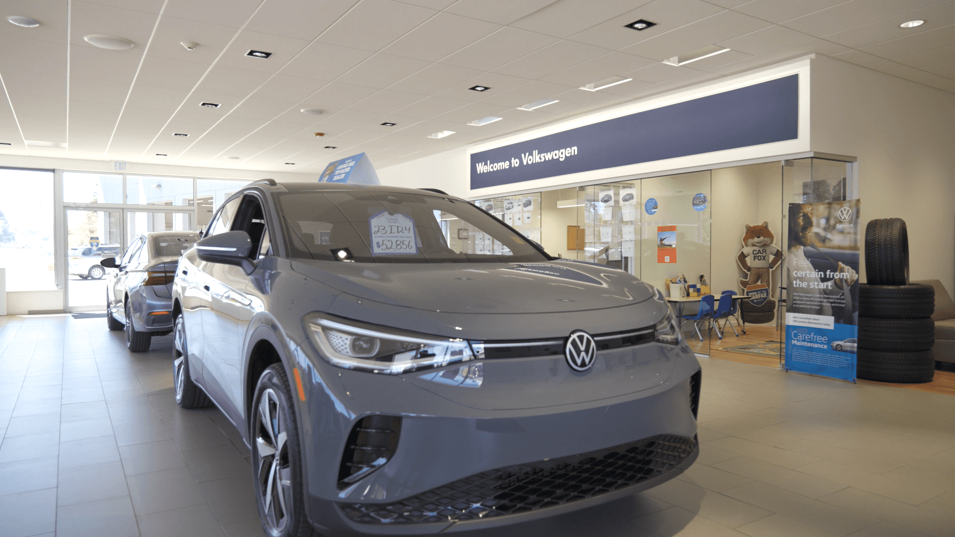 Kalispell Volkswagen Dealership Show Room with a gray 2023 ID.4 VW