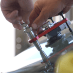 Technican finishing up a windshield repair at Kalispell Volkswagen