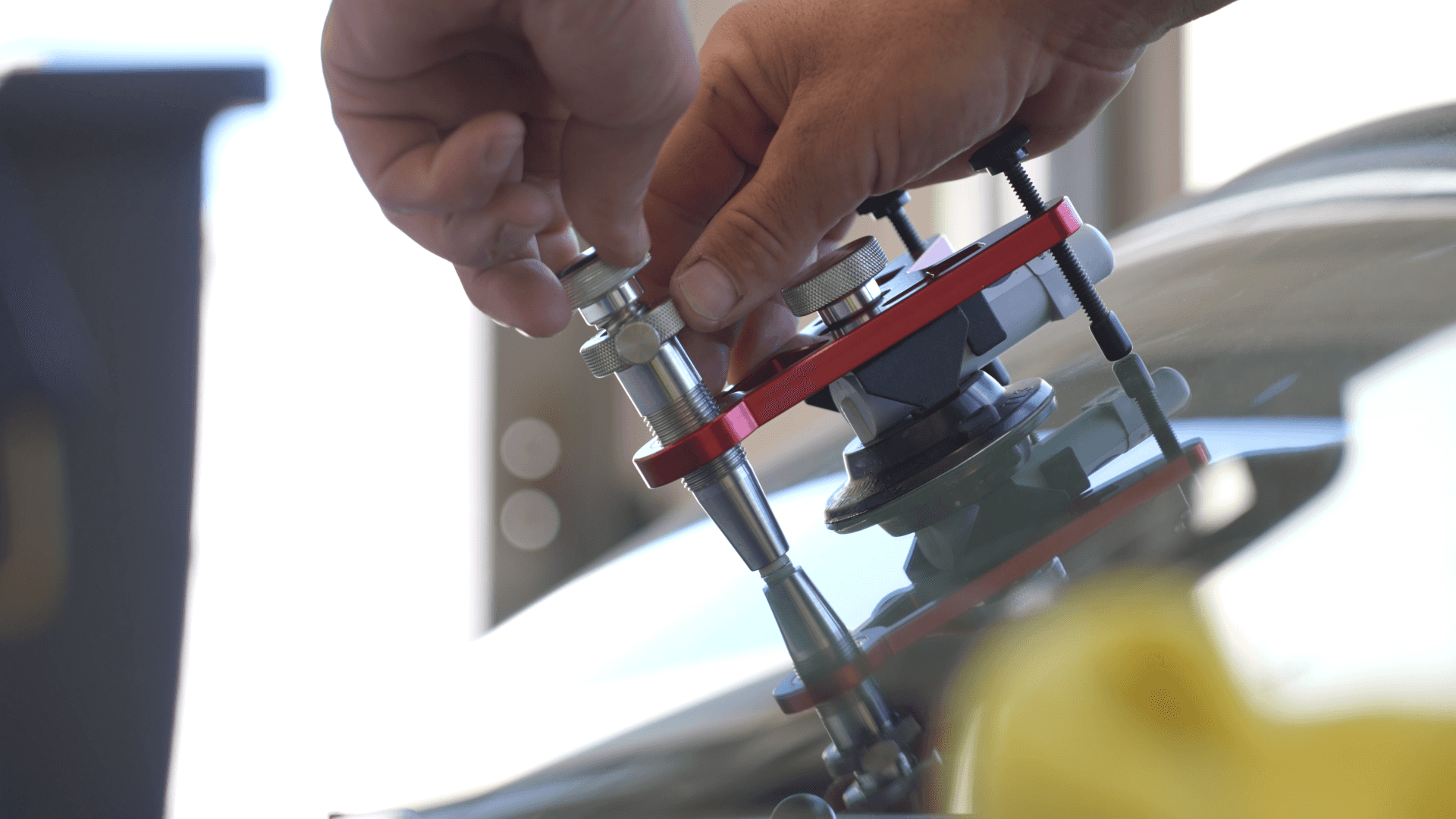 Technican finishing up a windshield repair at Kalispell Volkswagen