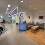 Flathead Valley Food Bank Backpack Program signage in the Kalispell Volkswagen Show Room