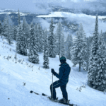Skier looking down a slope on Whitefish Mountain Resort in Whitefish Montana
