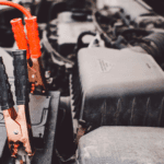 Stock image of Jumper Cables on a car battery