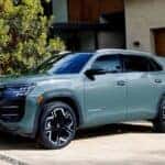 2027 Volkswagen Atlas Cross Sport lifestyle image in a driveway