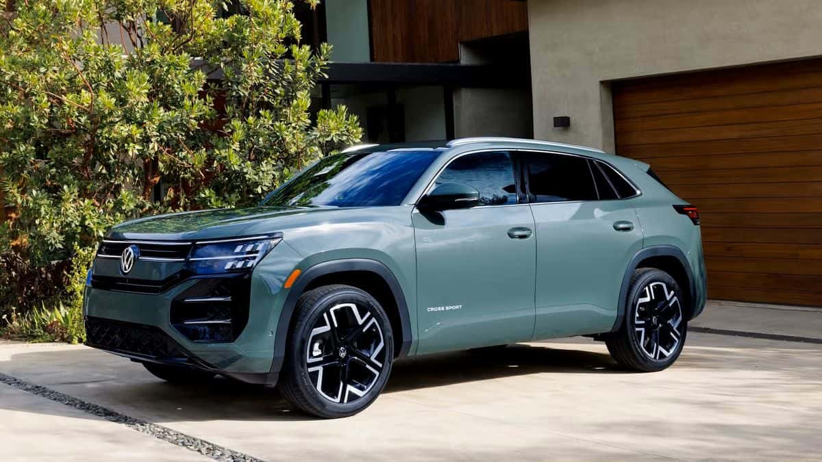 2027 Volkswagen Atlas Cross Sport lifestyle image in a driveway