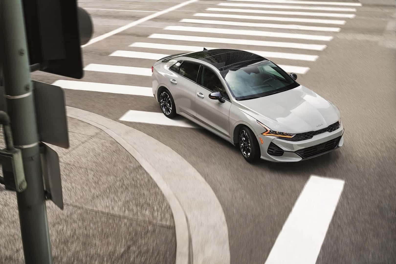 Kia Forte Turning On The Street