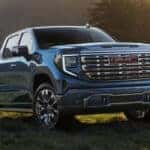 Blue GMC Sierra facing the right