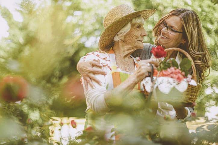 woman with her mom in the garden