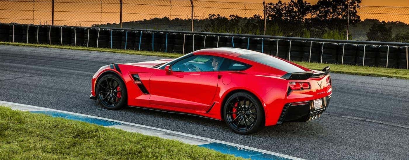 A red 2017 Chevy Corvette C7 is shown on a test drive at a used Chevy dealer near Hopkinsville.