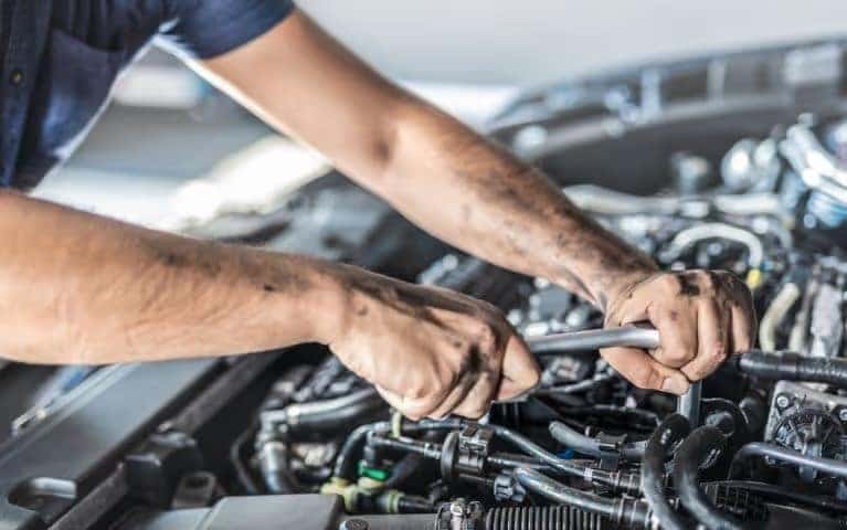 Mechanic working on car