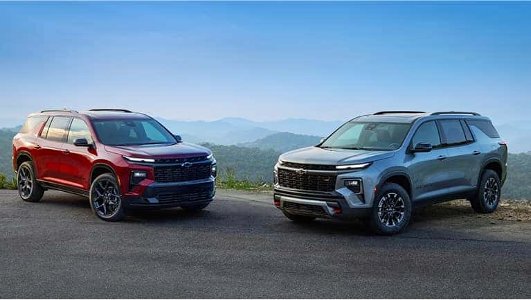 Two Chevy vehicles in parking lot