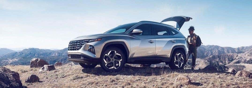 Silver 2022 Hyundai Tucson with Tailgate Open on a Trail