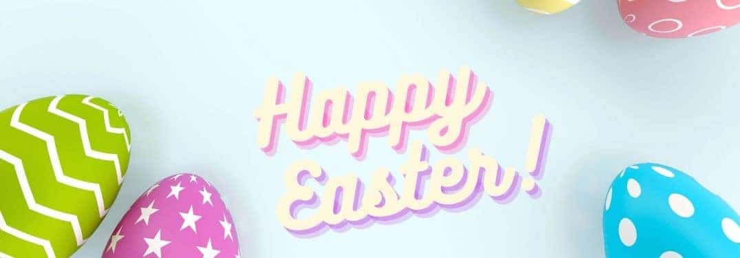 Colorful Easter Eggs on a Light Background with Shaded Happy Easter Text