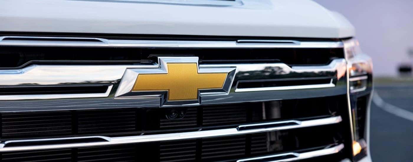 A close-up on a white 2024 Chevy Silverado 3500 HD LTZ.