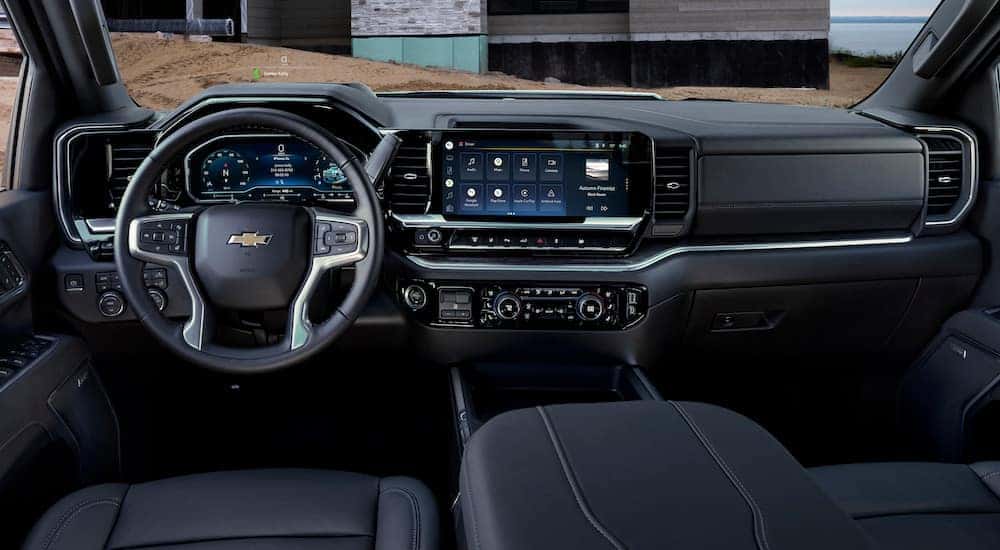 The black interior of a 2024 Chevy Silverado 3500 LTZ is shown.