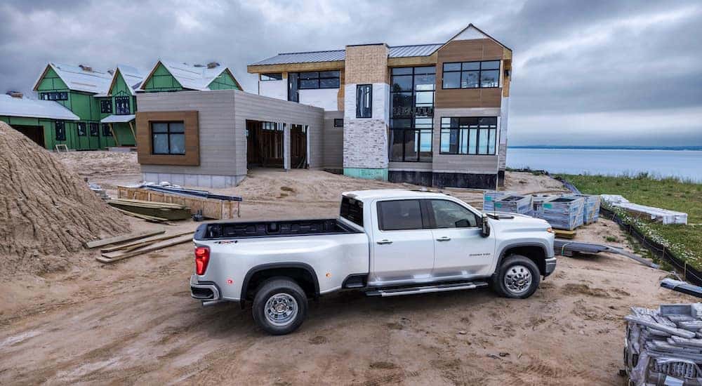 A white 2024 Chevy Silverado 3500 LTZ is shown from the side.