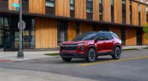 A red 2025 Chevy Equinox RS for sale near Poughkeepsie is shown from the front at an angle.
