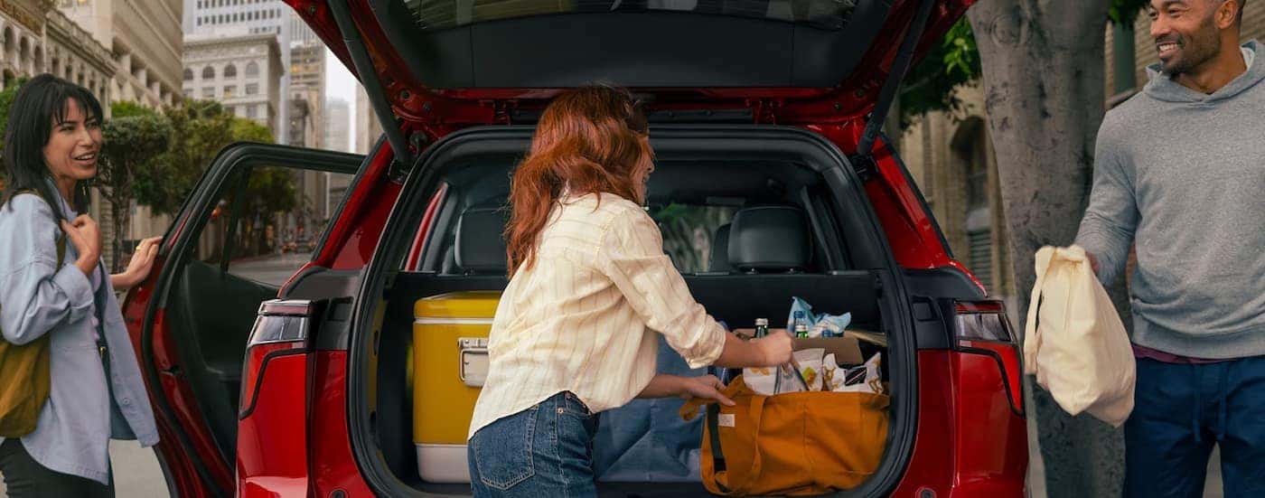 The cargo area is shown in a 2025 Chevy Equinox RS.