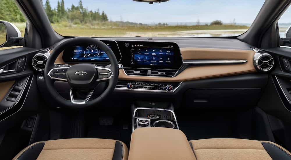 The tan interior of a 2025 Chevy Equinox for sale in Millbrook is shown.
