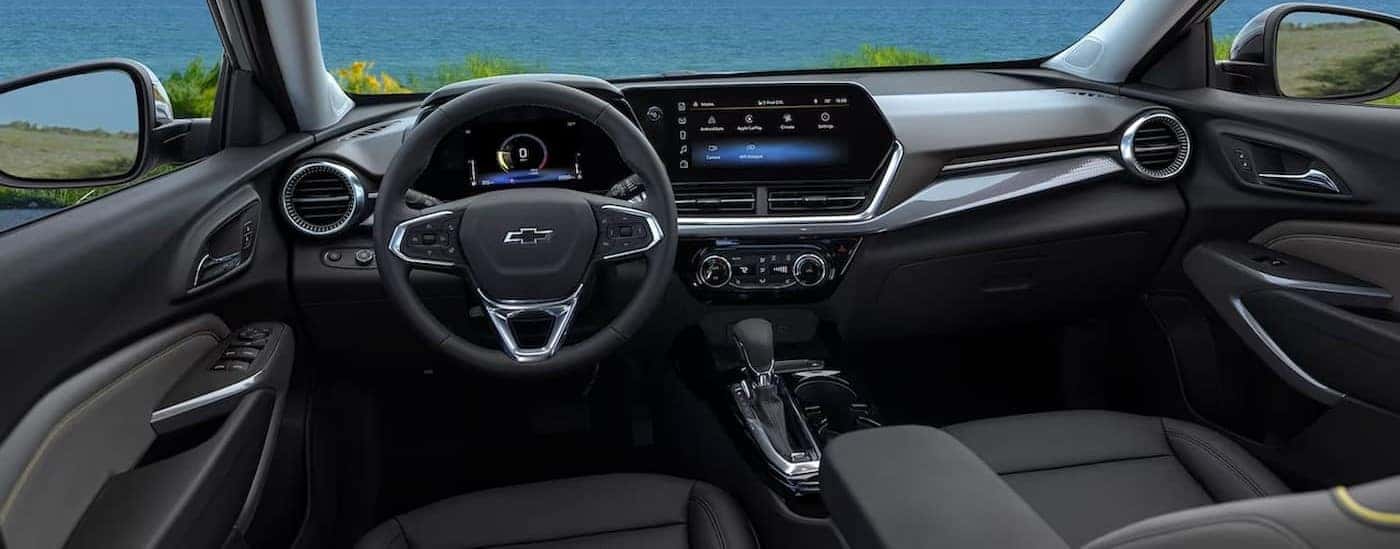 The black interior and dash are shown in a 2024 Chevy Trax for sale near Poughkeepsie.