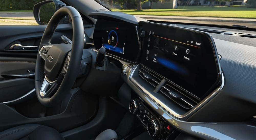 Steering wheel and infotainment screen in a 2025 Chevy Trax.