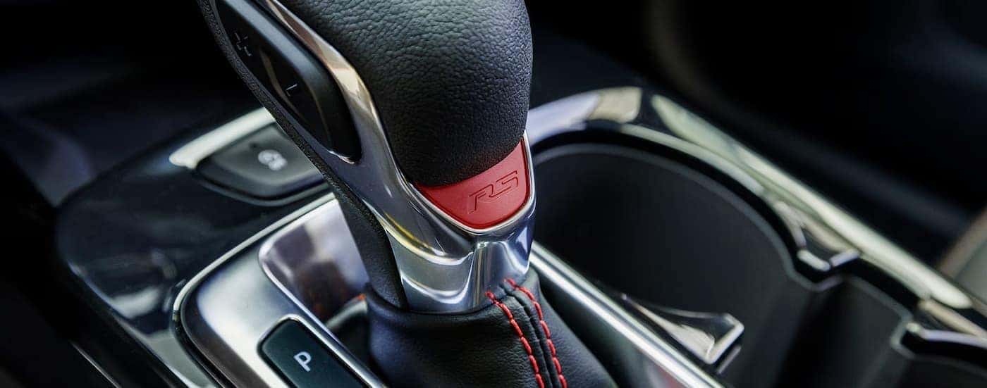 A close-up of the shifter is shown in a 2025 Chevy Trax RS.