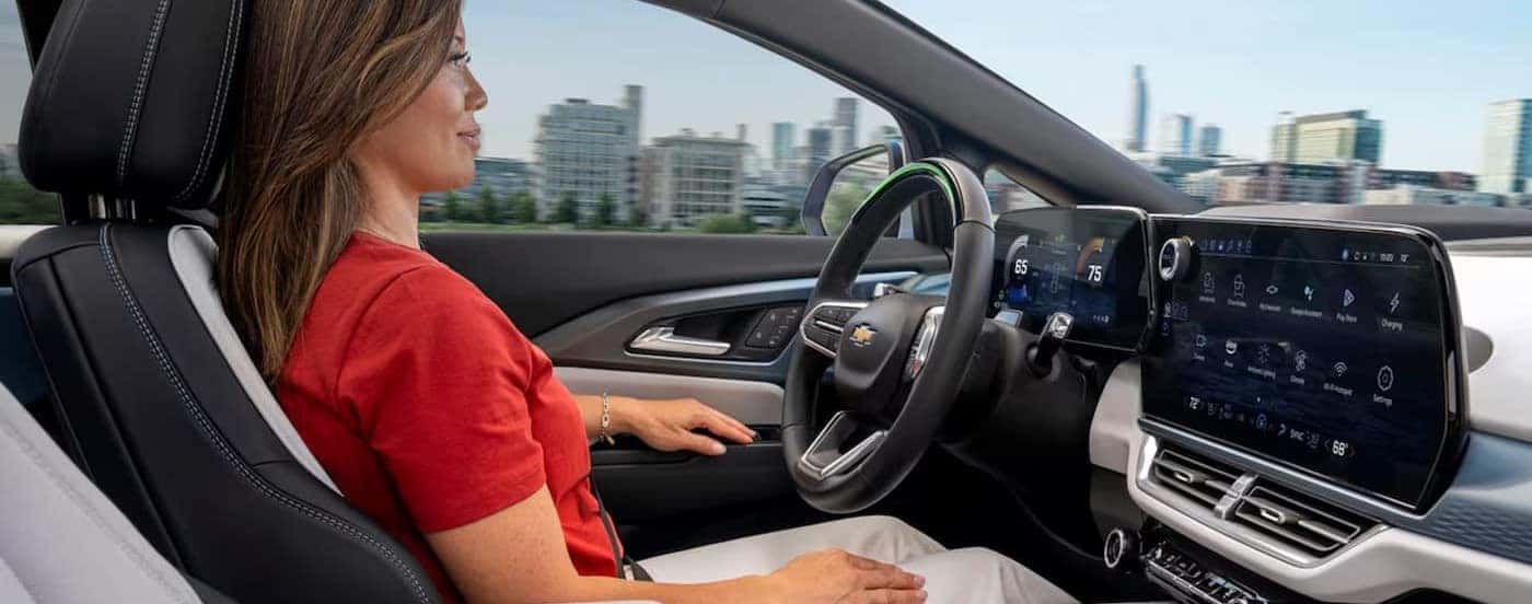 The black and white interior in a 2025 Chevy Equinox EV for sale in Millbrook.