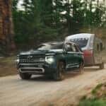 A green 2025 Chevy Tahoe for sale from the front.
