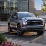 A silver 2025 Chevy Tahoe for sale from the front at an angle.