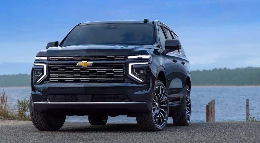 A black 2025 Chevy Tahoe from the front at an angle.
