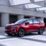 A red used 2022 Chevy Equinox RS Shadow from a used car dealership