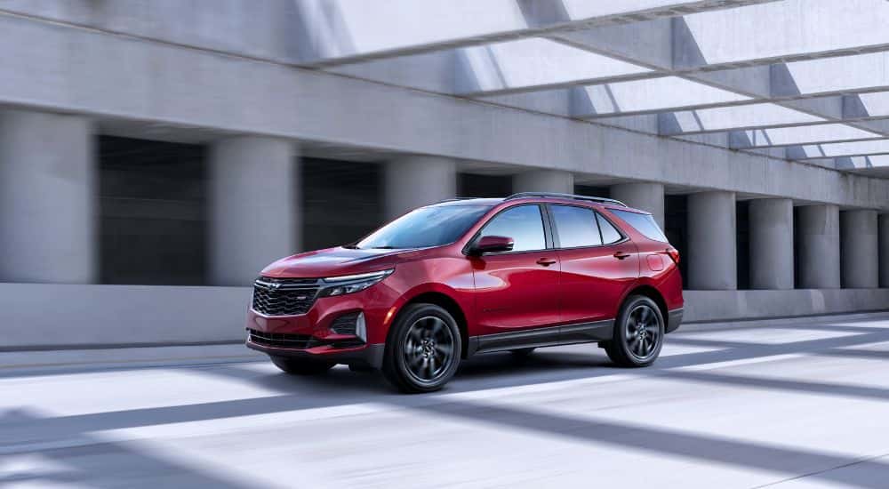A red used 2022 Chevy Equinox RS Shadow from a used car dealership