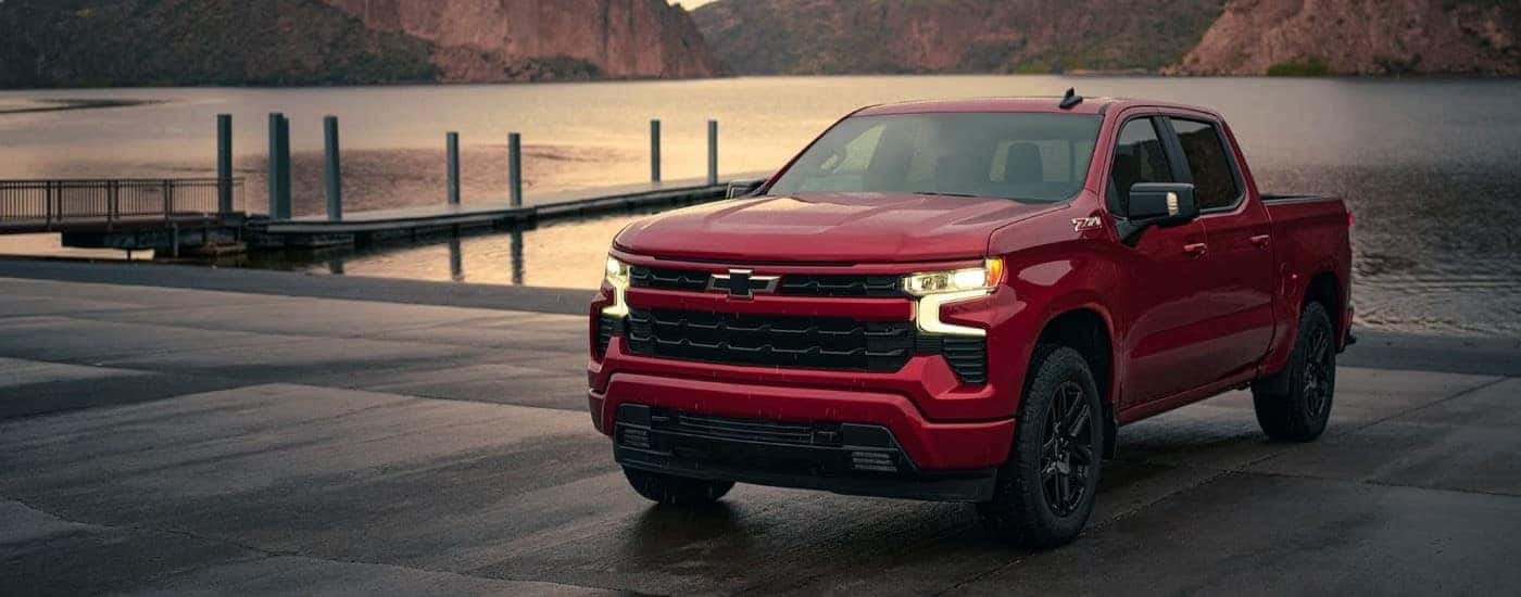 Red 2023 Chevy Silverado 1500 Z71 parked by water
