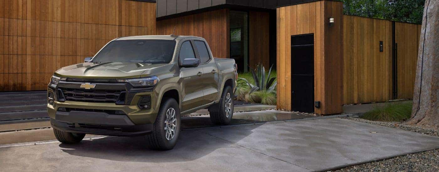 Green 2023 Chevy Colorado parked after looking at trucks for sale near Kingston