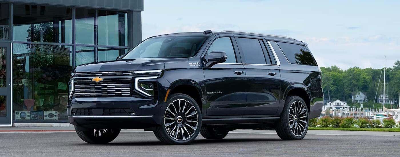A black 2026 Chevy Suburban High Country parked