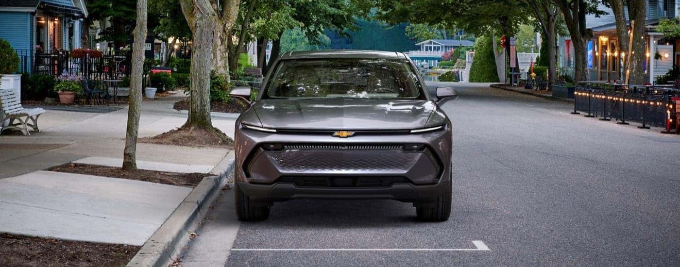 Silver 2024 Chevy Equinox EV parked on a street